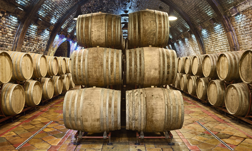 Whisky barrels in a storage room